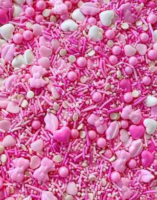 VARIETY SHAPED SPRINKLES INCLUDING HEART RECTANGLE AND ROUND SHAPED. wHITE PEARLED LIGHT PINK PINK